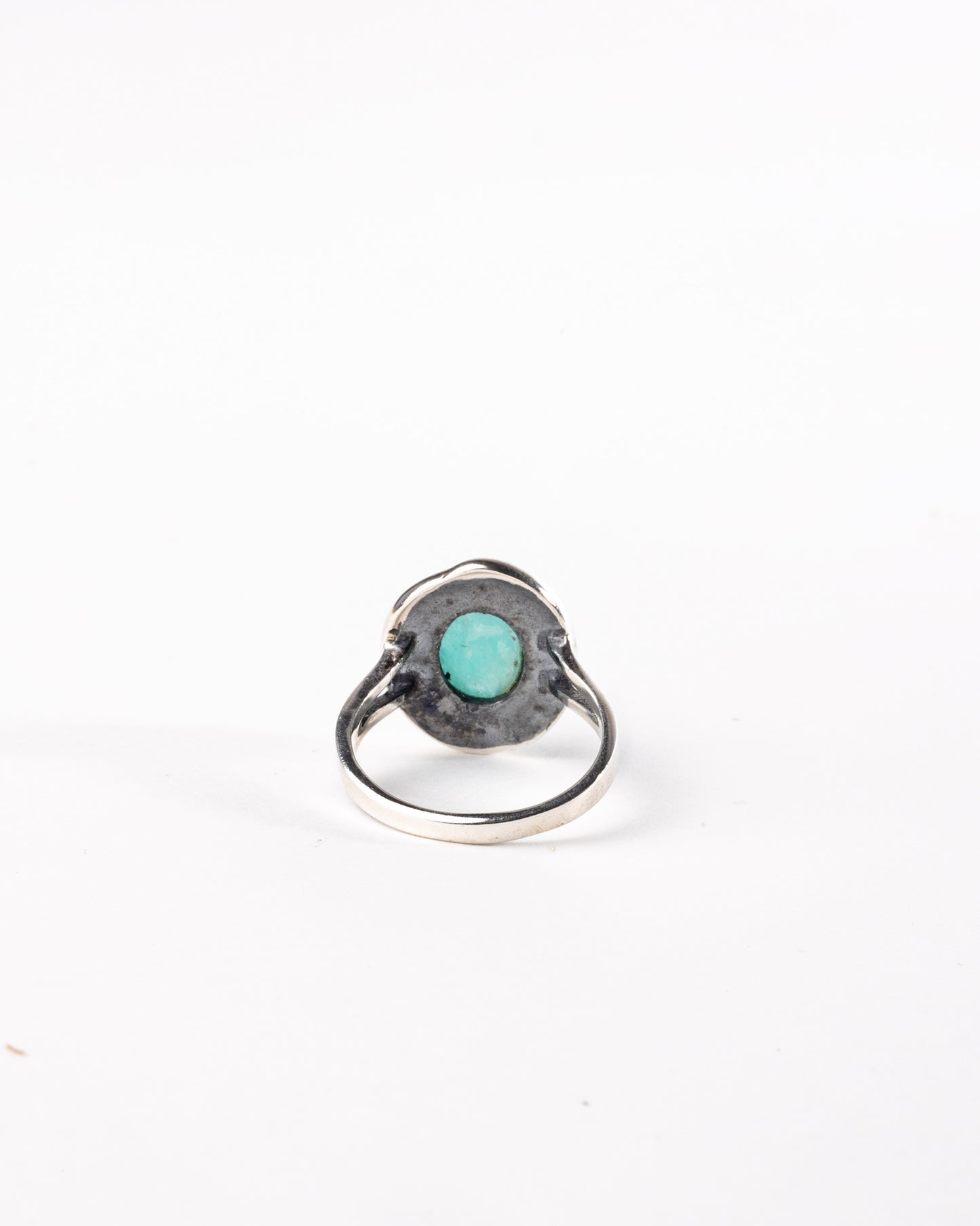 Ring "Larimar in geometric wreath"